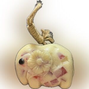 ADORABLE Elephant carved soap - from Thailand has a small rope attached.